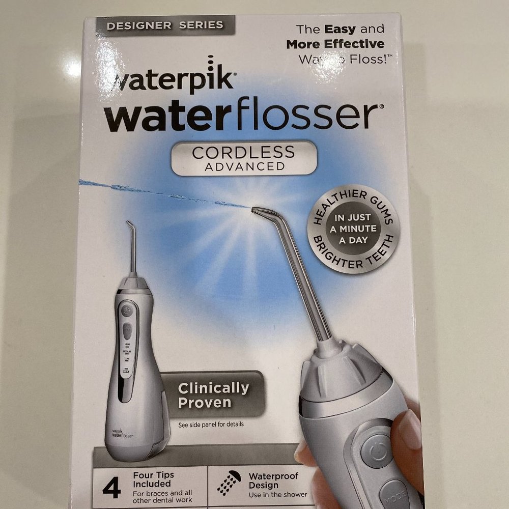 Unopened, never used, seal still on, waterpick